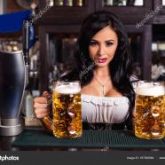 depositphotos_167062964-stock-photo-oktoberfest-brunette-woman-holding-beer.jpg